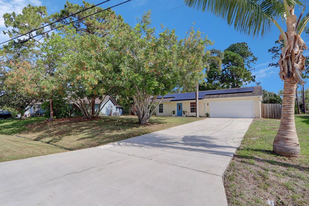 Photo of 1573 SW Wepaco Avenue, Port Saint Lucie, FL 34953 (MLS # R10990079)