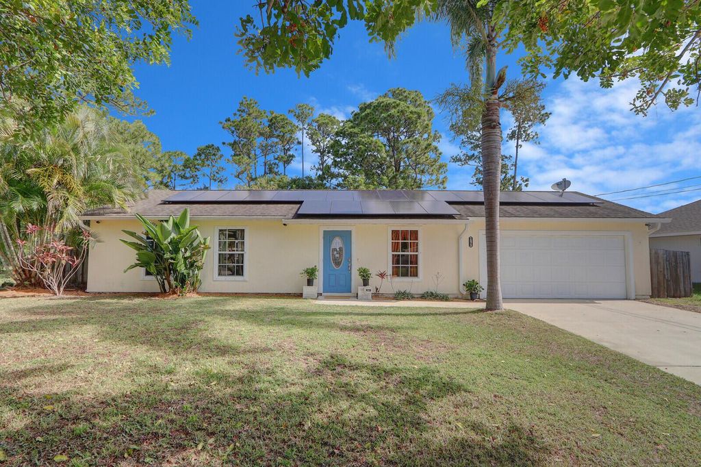 Photo of 1573 SW Wepaco Avenue, Port Saint Lucie, FL 34953 (MLS # R10990079)