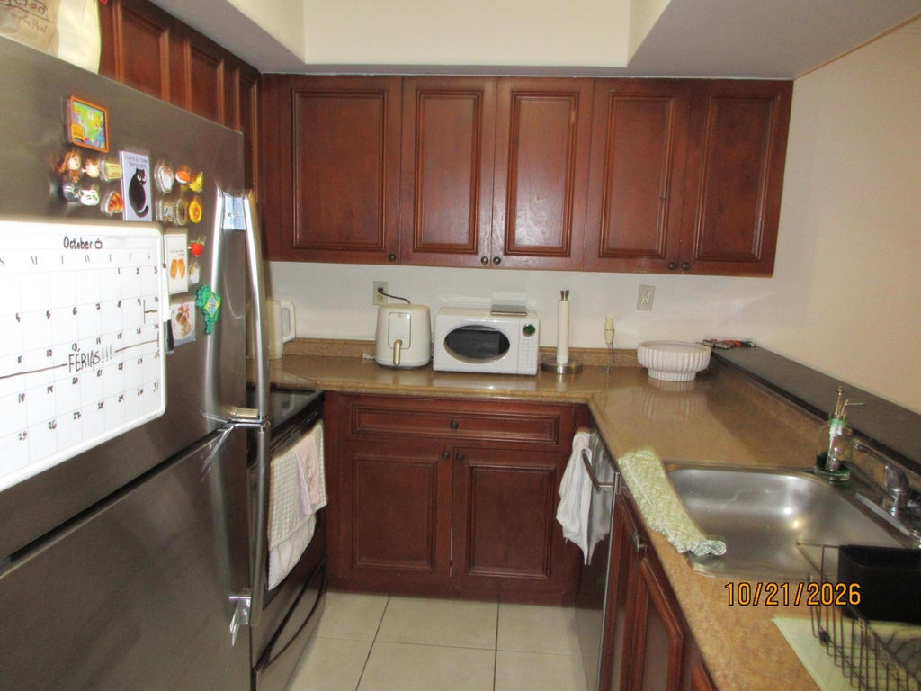 Photo of 836 CRYSTAL LAKE Drive, Deerfield Beach, FL 33064 (MLS # B26091429)