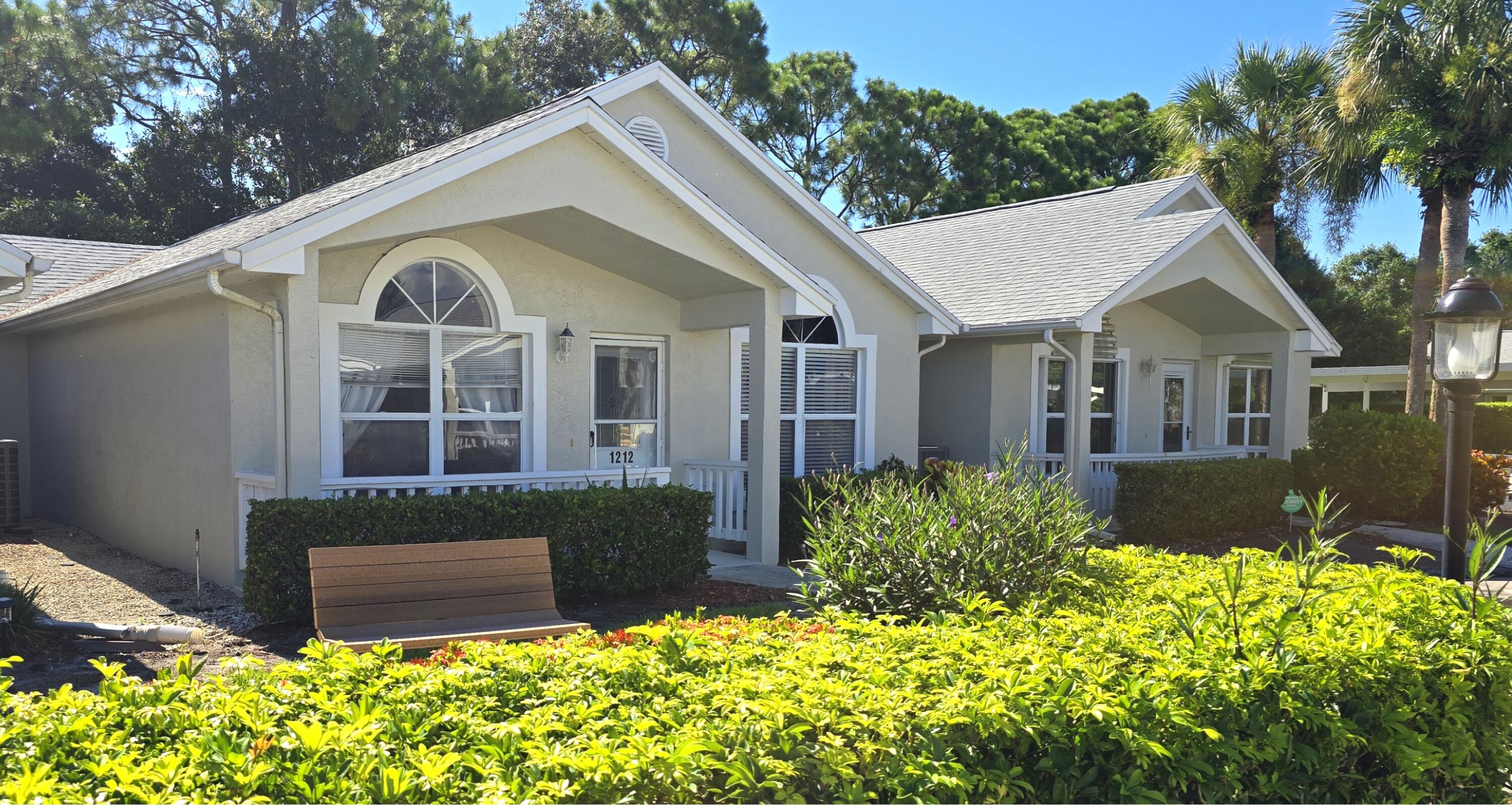 Fabulous 2BR/2BA Villa in the desirable Isle of Lombardy at Kings Isle--Port St. Lucie's 55+ gated community. Featuring an updated 2022 roof, A beautiful screen-enclosed lanai. You front porch is a traquil setting with courtyard fountain. Open kitchen with breakfast bar and pantry. Tile flooring throughout. New electrical panel installation coming soon. Enjoy quiet mornings or relaxing evenings on your charming front porch or serene lanai.Kings Isle offers resort-style amenities at The Royal Club: pool/spa, tennis, pickleball, fitness center, billiards, basketball, ballroom, library, arts & crafts, card rooms, clubs, entertainment, and organized travel. HOA includes manned gate, lawn care, cable, internet, exterior painting, and access to all common areas.