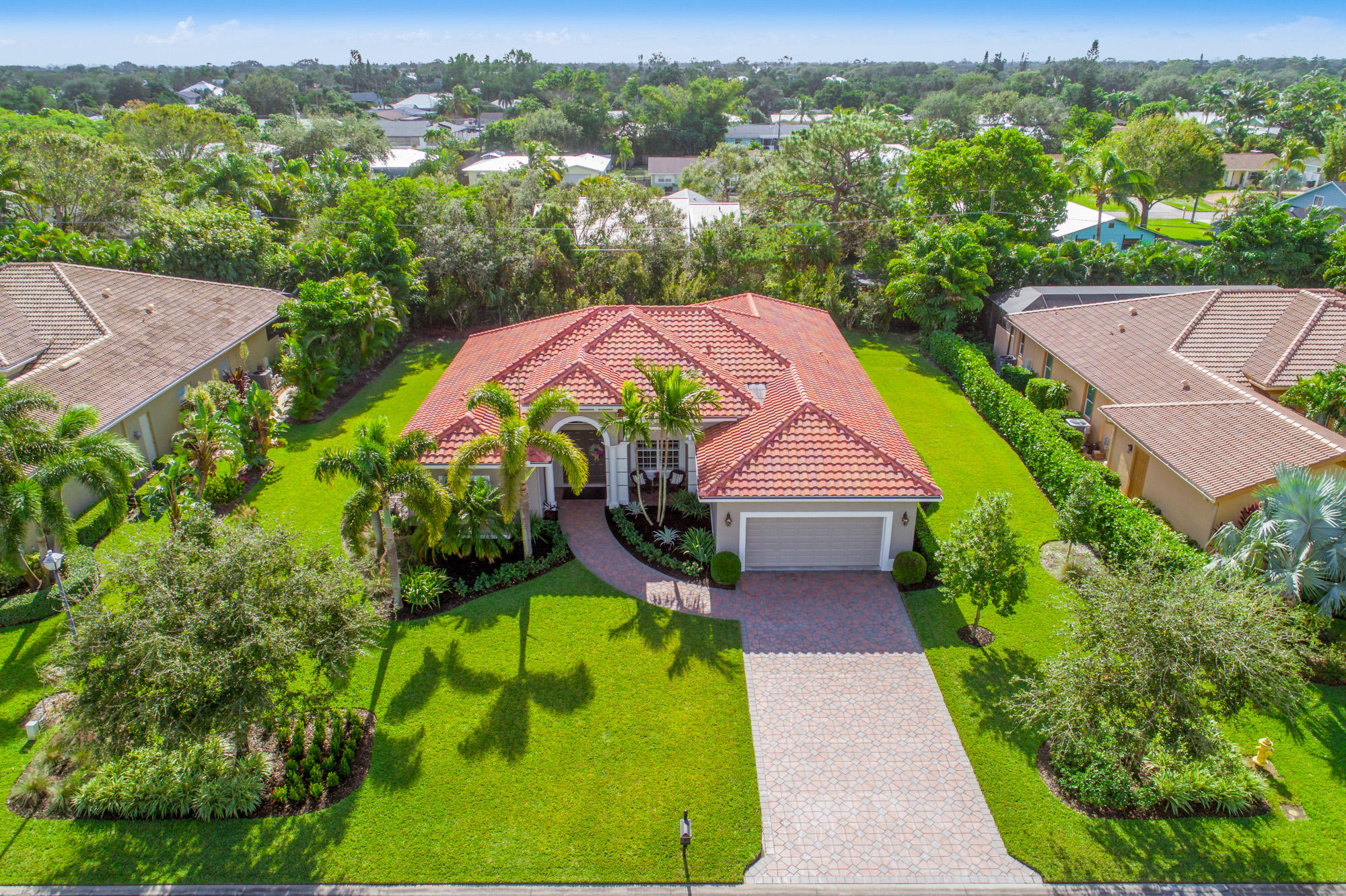 Rare opportunity. Like new CBS home in the gated community of Inlet Isle. This is a meticulous move-in ready 4 bed/3 bath home loaded with upgrades including; en suite master, crown moldings, plantation shutters, tile floors throughout, professionally designed landscape, covered front and rear patios, newer AC, impact windows and a huge yard to accommodate a large pool! Won't last. A must see. No RV or boats can be parked in the driveway.