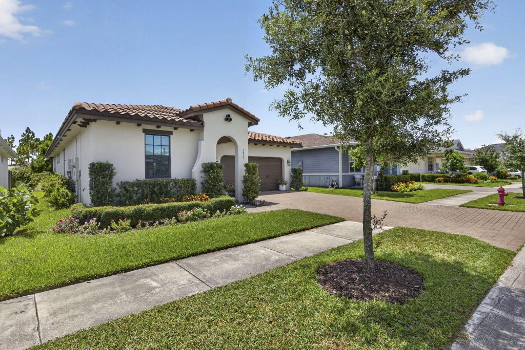 Photo of 1217 Wandering Willow Way, Loxahatchee, FL 33470 (MLS # B26052096)