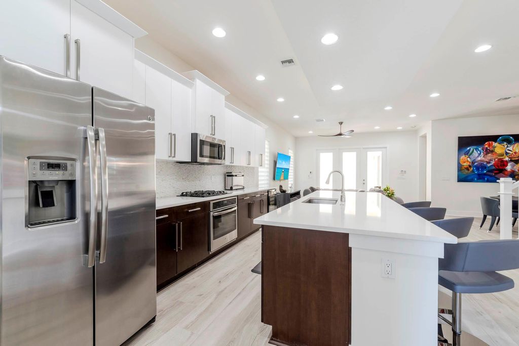 Photo of 5029 Grandiflora Road, Palm Beach Gardens, FL 33418 (MLS # R10920361)