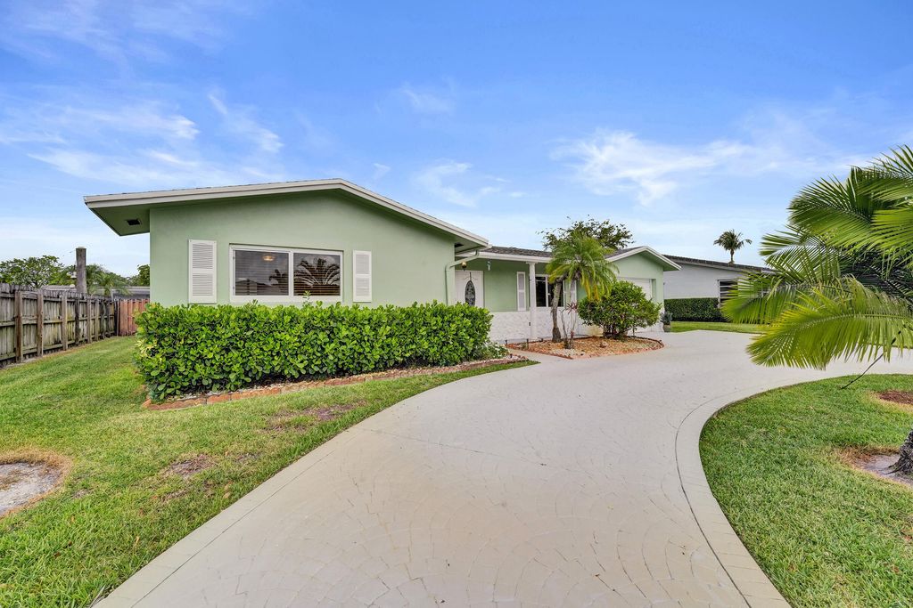 Photo of 1710 NW 111th Terrace, Pembroke Pines, FL 33026 (MLS # B26028849)