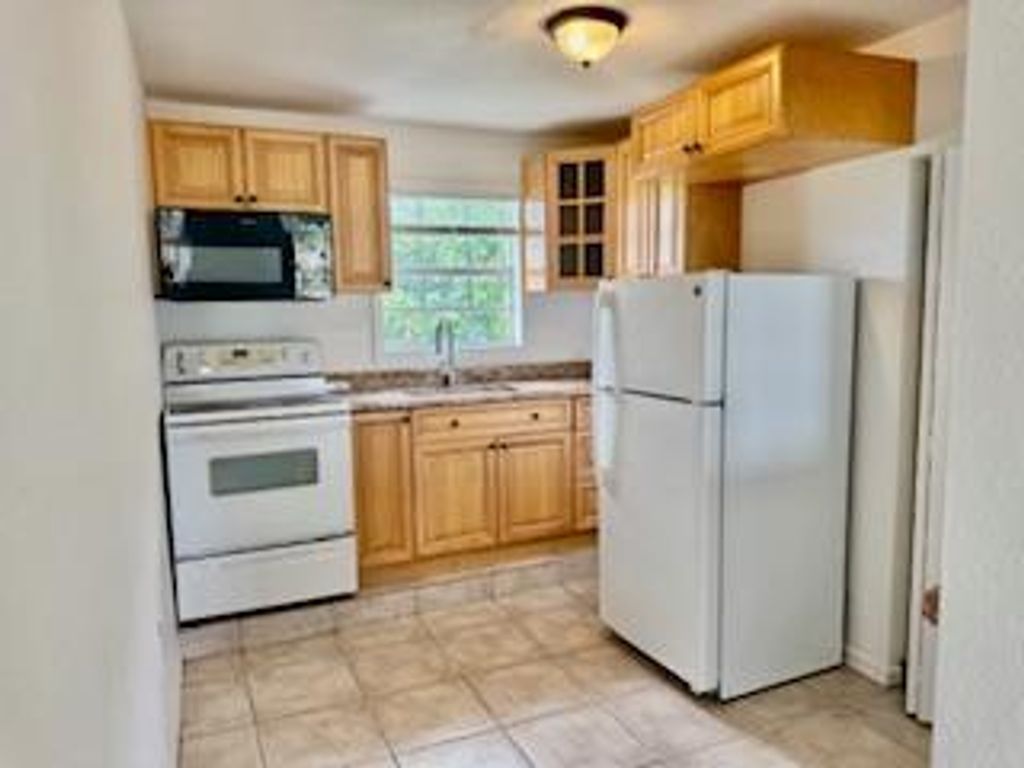 Photo of 1260 Dr Martin Luther King Jr Boulevard, Riviera Beach, FL 33404 (MLS # R11097024)