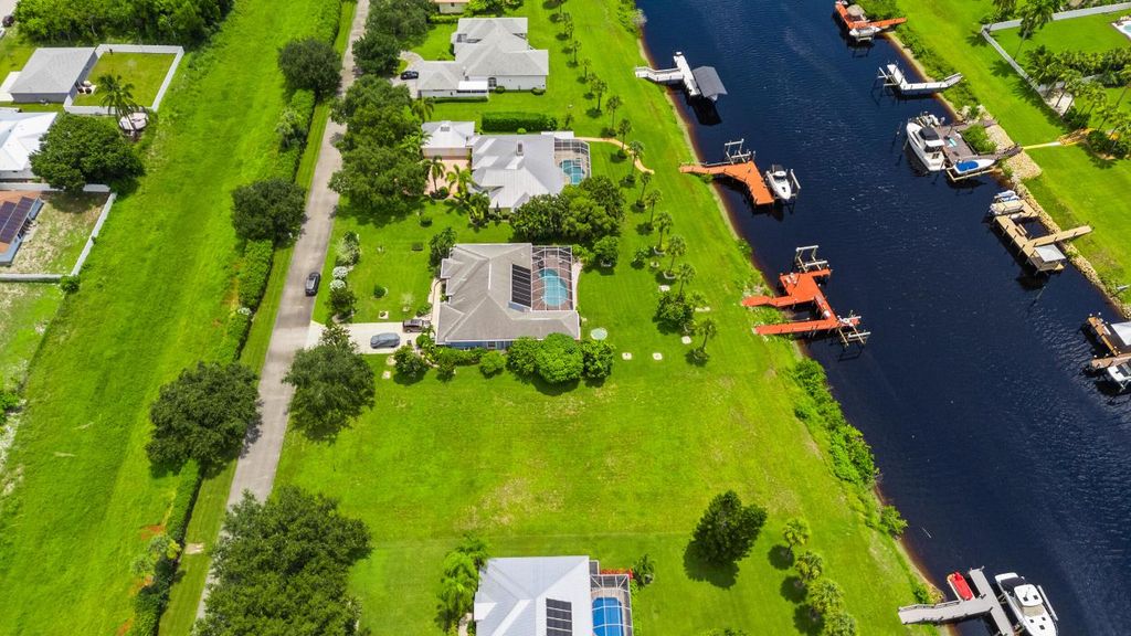 Photo of 2606 SW River Shore Drive, Port Saint Lucie, FL 34984 (MLS # R11010088)