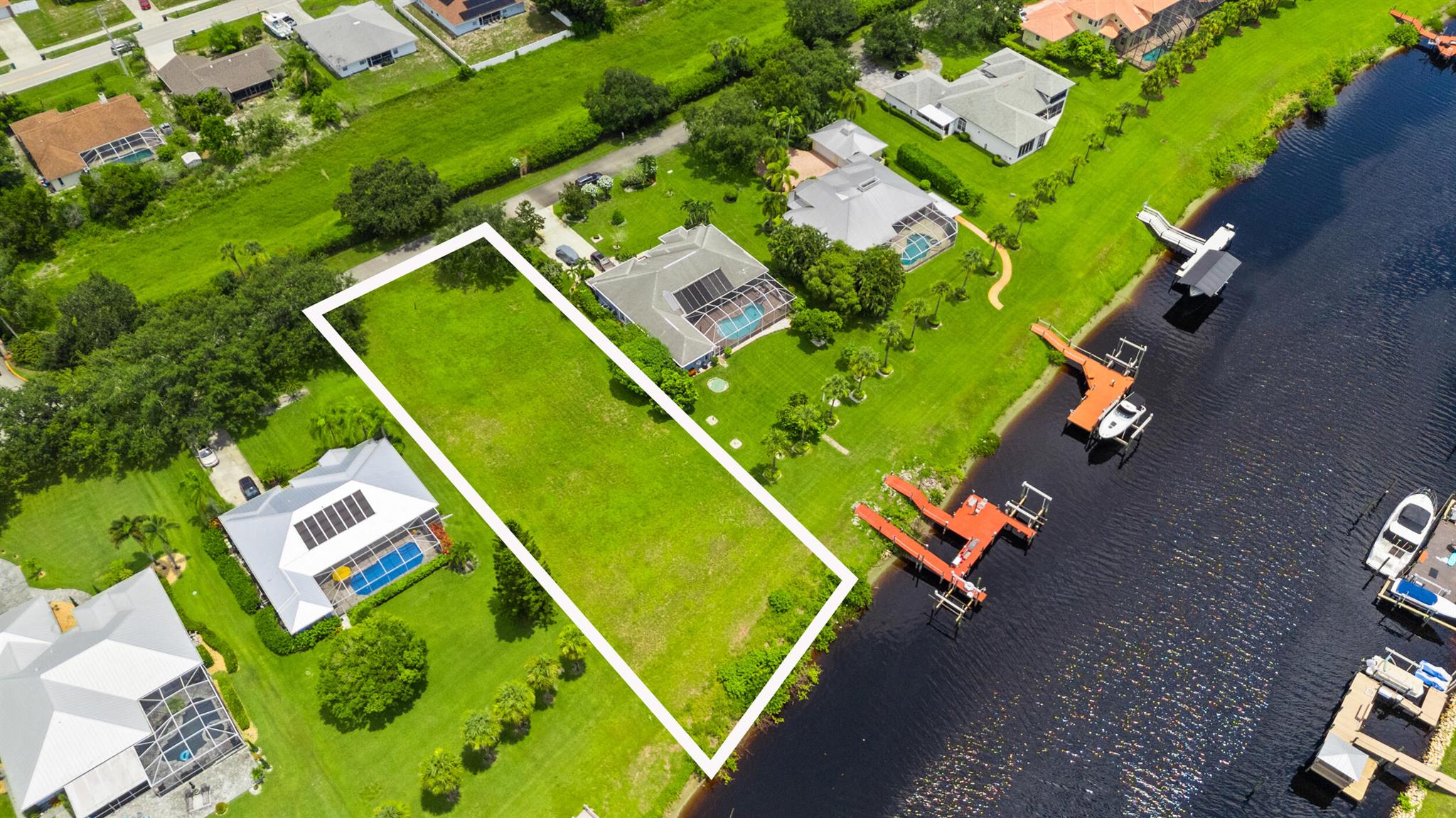 Embrace the coastal lifestyle with this rare waterfront homesite in the sought-after South River Shores. Enjoy wide canal views and deep water access, ideal for boating and ocean enthusiasts. This 0.5-acre lot is the last homesite available in South River Shores. Nestled in a beautiful private gated community with low HOA fees, offering the perfect opportunity to build your dream home on the water. Conveniently located near the Florida Turnpike providing easy access to all that Port St. Lucie and Stuart have to offer.