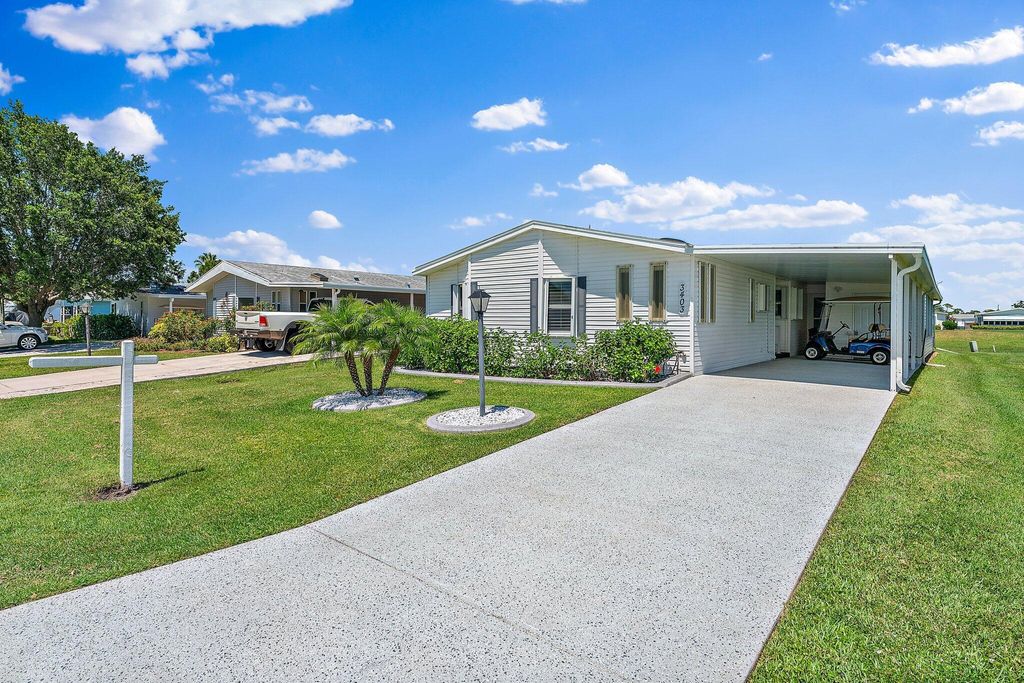 Photo of 3403 Ironwood Avenue, Port Saint Lucie, FL 34952 (MLS # R10990411)