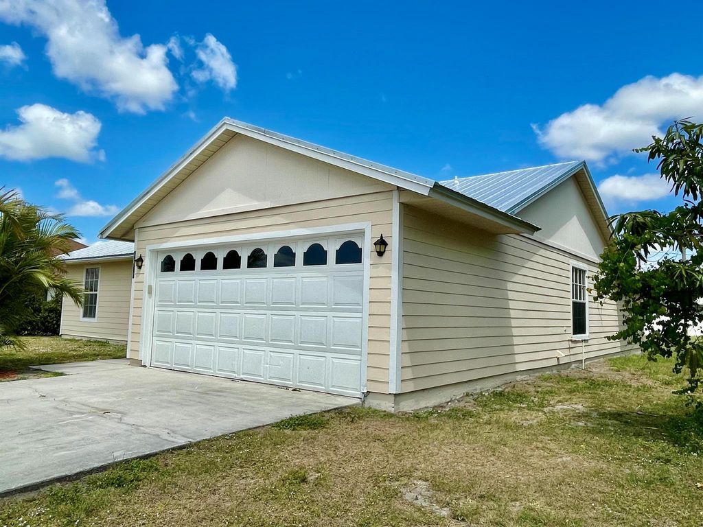 Photo of 4686 SW Nackman Ter, Port Saint Lucie, FL 34953 (MLS # R11083057)