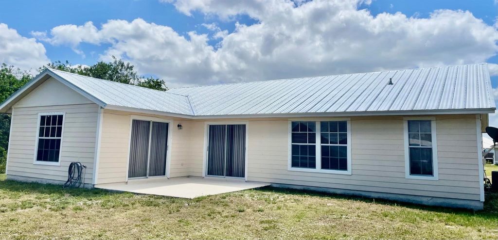 Photo of 4686 SW Nackman Ter, Port Saint Lucie, FL 34953 (MLS # R11083057)