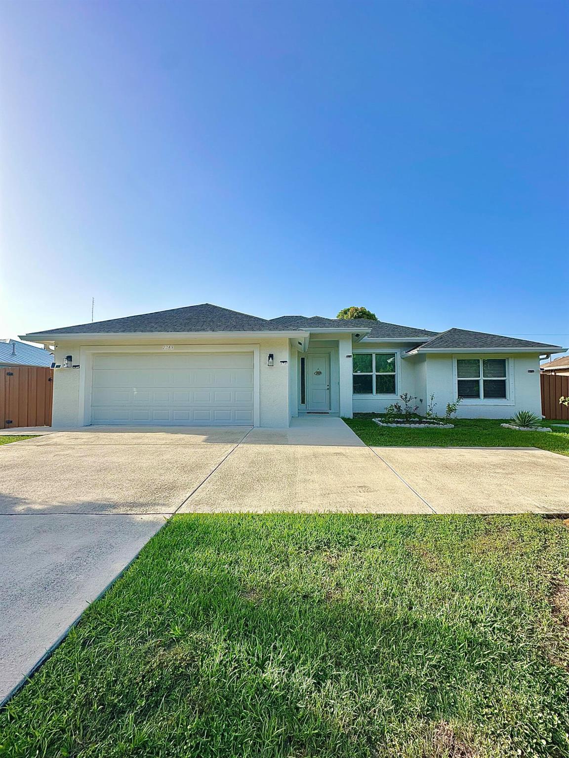 This beautifully, 3-bedroom, 2-bathroom home built in 2022 offers modern comfort in a highly desirable location. Inside, enjoy a bright open layout with stainless steel appliances, quartz countertops, and stylish finishes throughout--completely turnkey and move-in ready. Step outside to your private, fully fenced backyard, perfect for outdoor dining, relaxing, or pets. Located just 12 minutes from the beach and 10 minutes from downtown Stuart, you'll be close to dining, shopping, and entertainment while enjoying the peace of a quiet residential neighborhood. Call to set up a private showing!