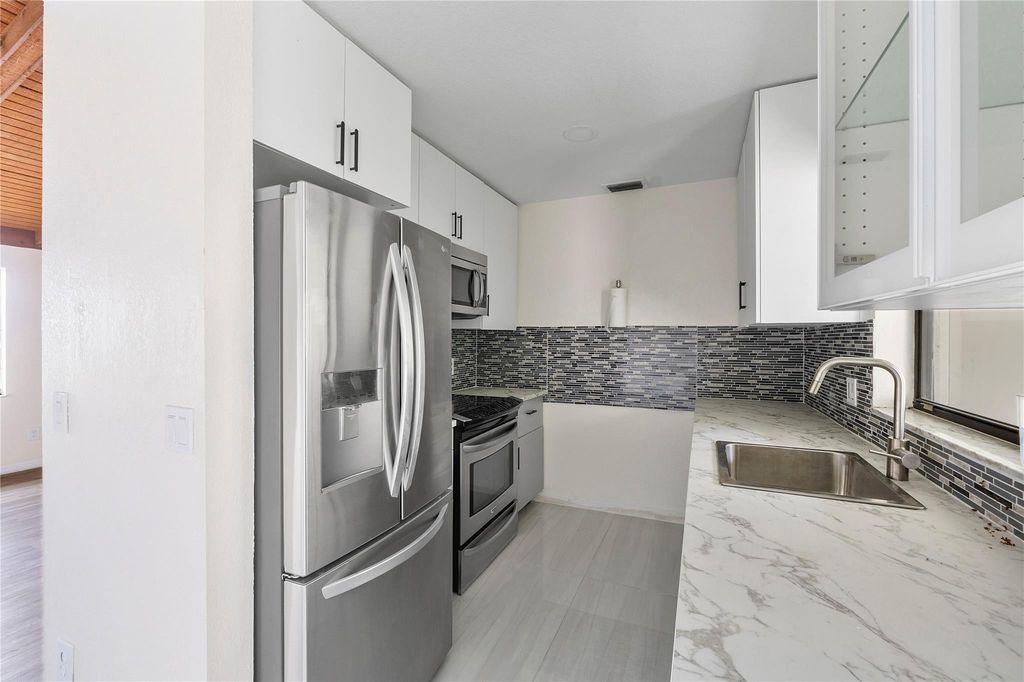 Photo of 3303 Kirk Road #5, Lake Worth, FL 33461 (MLS # B26026501)