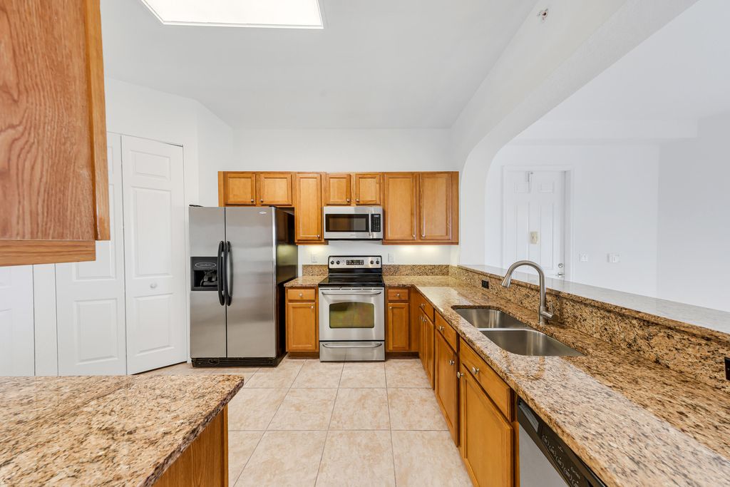 Photo of 3600 Oaks Clubhouse Drive #501, Pompano Beach, FL 33069 (MLS # B26011599)