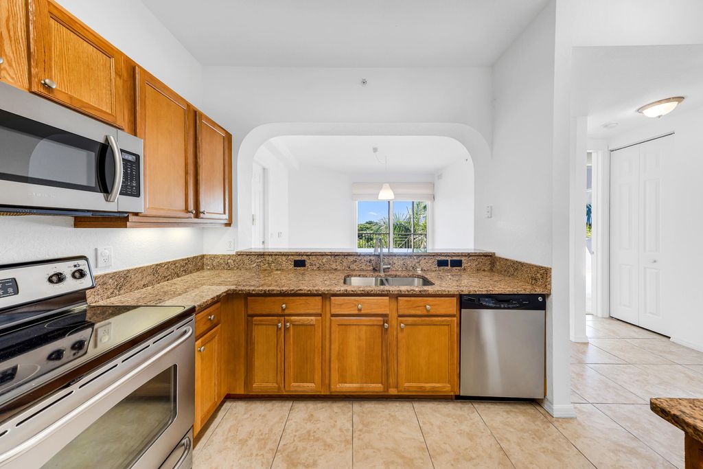 Photo of 3600 Oaks Clubhouse Drive #501, Pompano Beach, FL 33069 (MLS # B26011599)