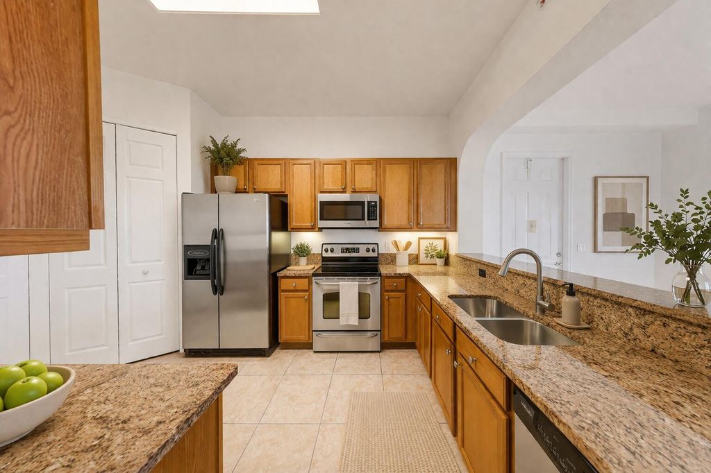 Photo of 3600 Oaks Clubhouse Drive #501, Pompano Beach, FL 33069 (MLS # B26011599)