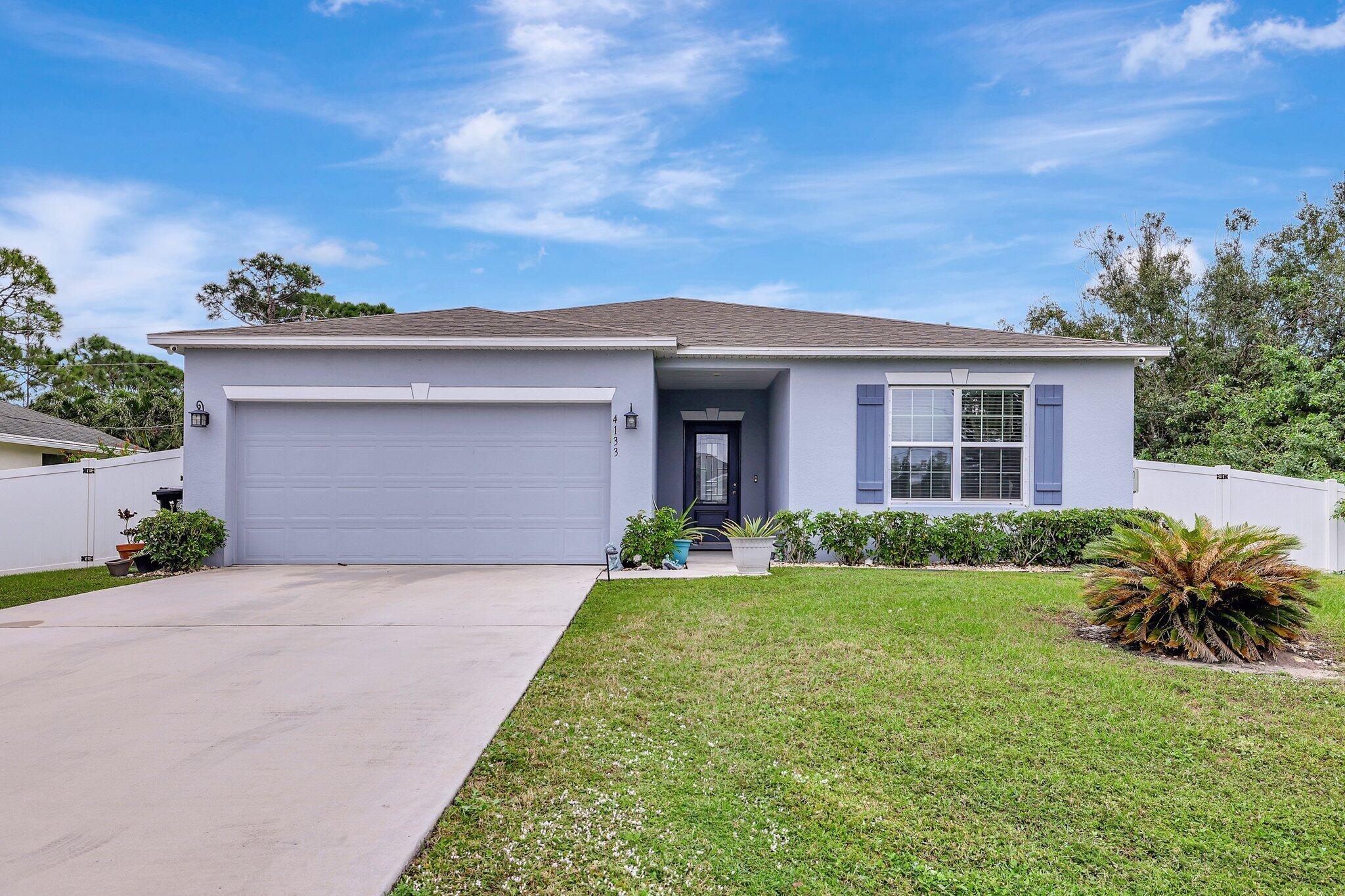 Step inside this newly built stunning 4-bedroom, 2-bathroom home with a 2-car garage, perfectly nestled in a peaceful neighborhood. Boasting modern flair and thoughtful upgrades, this newly built gem features a chic barn door that adds character, a chef's kitchen with a large island and granite countertops perfect for indoor entertaining, and on the outside a heavy-duty white vinyl fence enclosing a generous backyard--plenty of space for a pool, barbecues, or family fun!With 1,963 sq. ft. of beautifully designed living space, this move-in-ready home is ideal for growing families or first-time buyers. Located just minutes from I-95 and Florida's Turnpike, your commute will be a breeze. Don't wait--claim this stylish haven before it's gone!