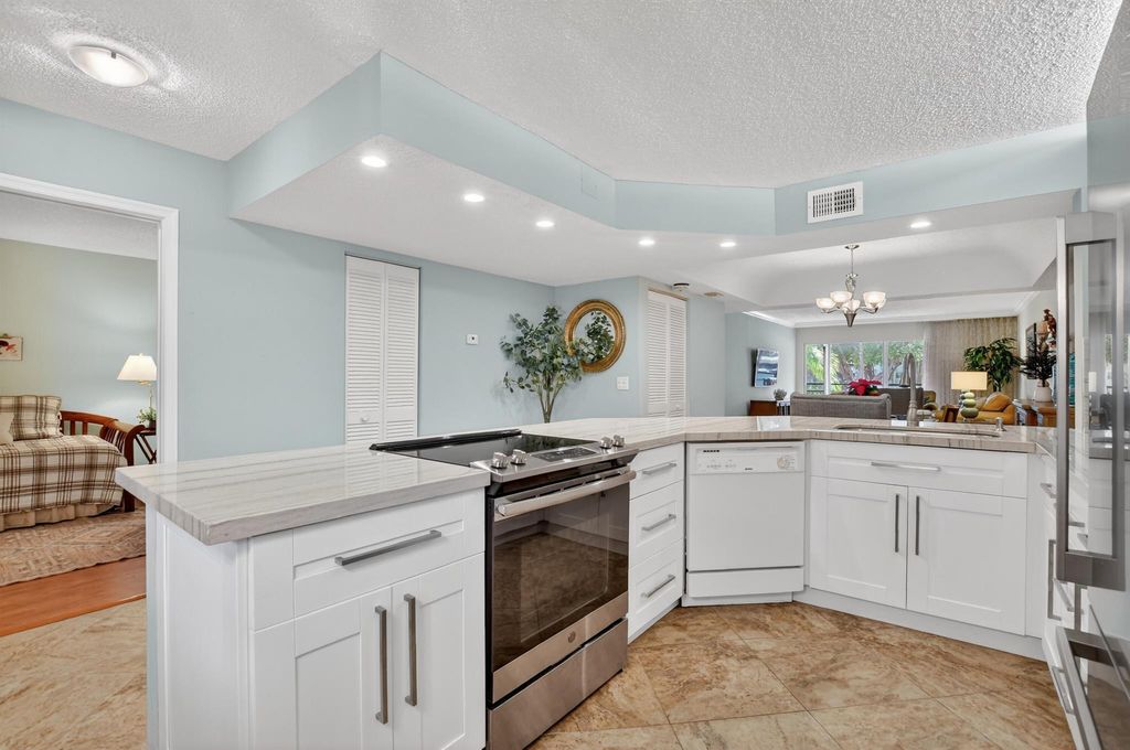 Photo of 23345 Carolwood Lane #205, Boca Raton, FL 33428 (MLS # R11147913)