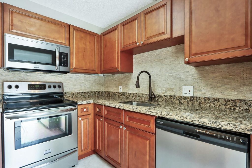 Photo of 121 1st Terrace, Palm Beach Gardens, FL 33418 (MLS # R10901923)