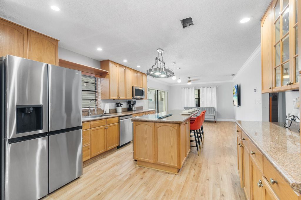 Photo of 3301 NW 97th Terrace, Sunrise, FL 33351 (MLS # R11163999)