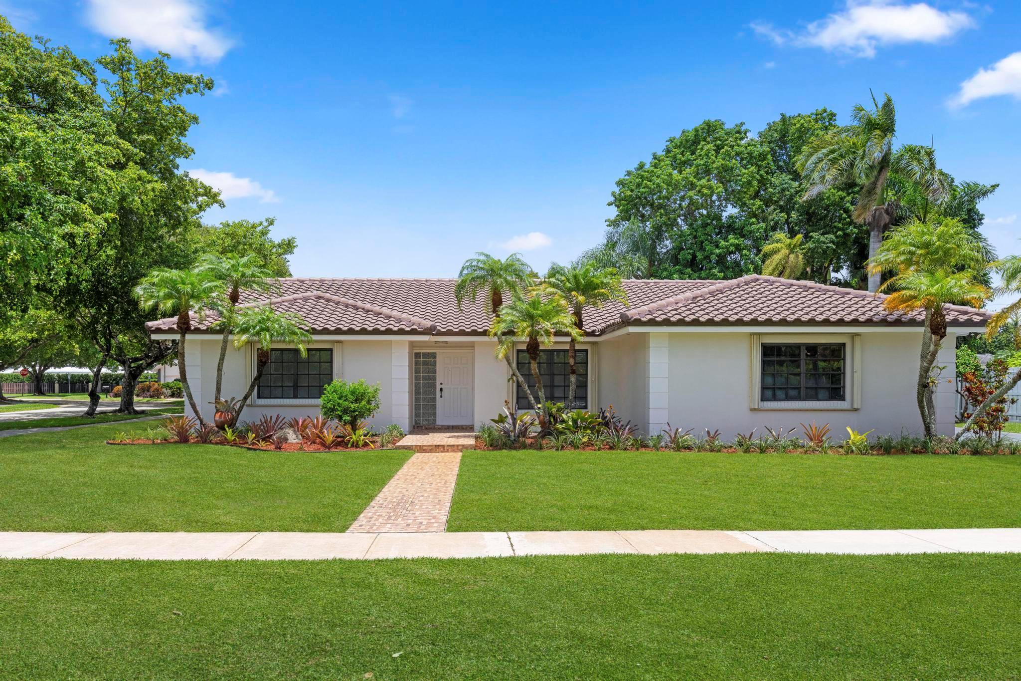 LOCATION, LOCATION, LOCATION! Centrally located in sought-after Kings Creek Village. Beautifully renovated 3BD/2BA corner home offers a bright open layout, new tile floors, spacious kitchen with breakfast area, formal living/dining, family room, and large covered terrace perfect for entertaining. Master room features walk-in + extra closet. Enjoy a new roof, updated pool, 2-car garage, driveway for 6+ cars, and lush landscaping. Community includes 24-hr security, clubhouse, tennis, pickleball, parks, and trails. Minutes to Dadeland Mall, top hospitals, UM, FIU, top rated schools, and major highways