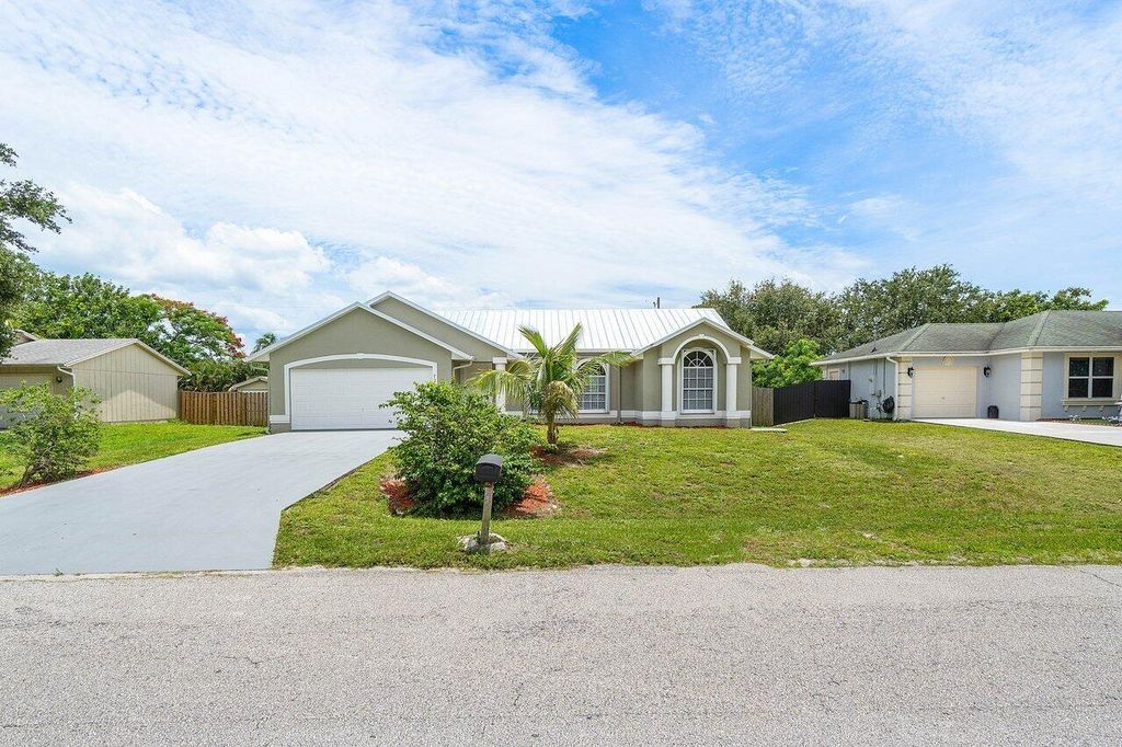 Photo of 726 SW Colleen Avenue, Port St Lucie, FL 34983 (MLS # R10900433)