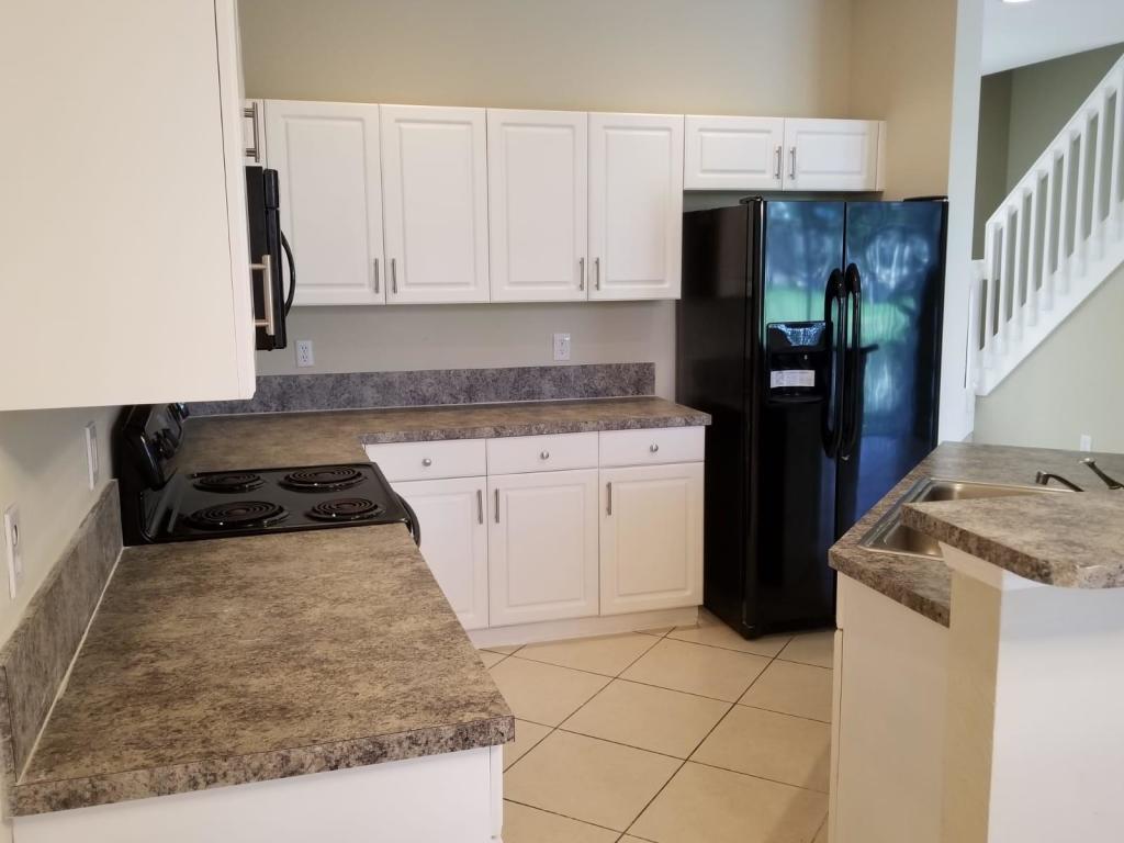 Photo of 984 LUCAYA Drive, Riviera Beach, FL 33404 (MLS # B26093216)