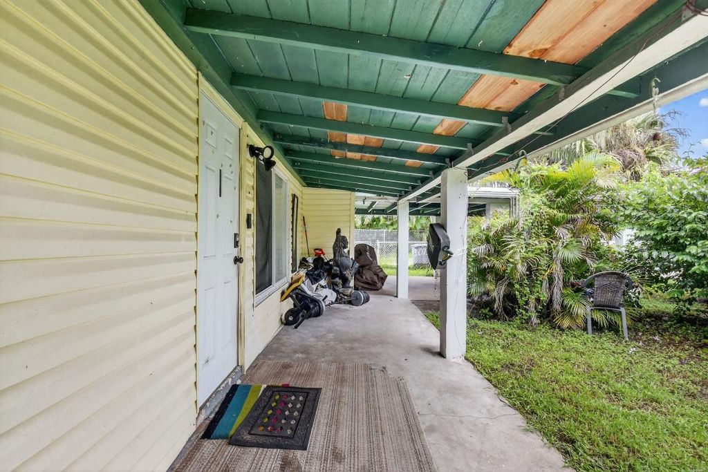 Photo of 1079 Highview Road, Lake Worth, FL 33462 (MLS # R11131577)