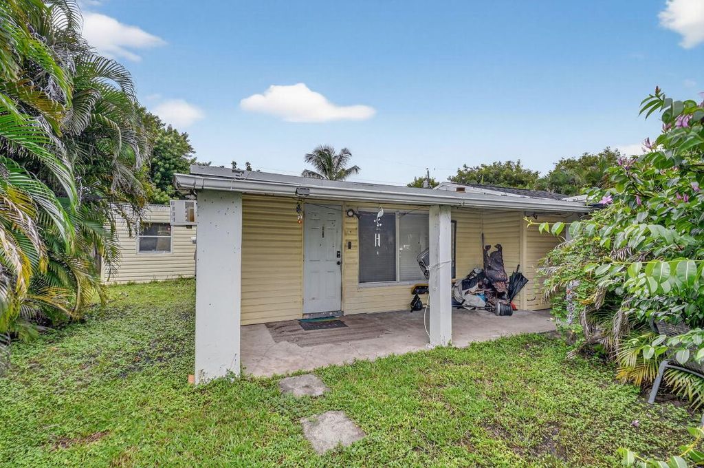 Photo of 1079 Highview Road, Lake Worth, FL 33462 (MLS # R11131577)