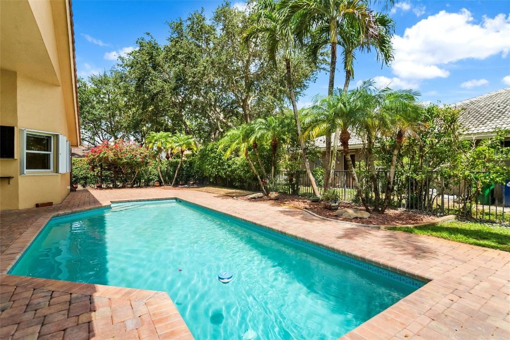 Photo of 9881 NW 49th Place, Coral Springs, FL 33076 (MLS # F10503424)