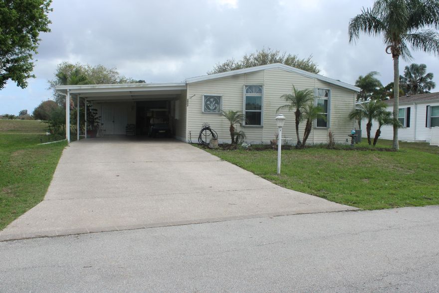Beautiful 2-bedroom, 2-bath home with a den located in the highly sought-after 55+ community of Savannah Club in Port St. Lucie. This well-maintained modular home offers 1,566 sq ft of living space and 2,578 total sq ft, featuring a spacious layout, screened porch, and covered carport. The wide concrete driveway provides ample parking, including space for a golf cart. Enjoy resort-style living with community amenities, activities, and a prime location close to shopping, dining, and major roadways. Land lease community with monthly lot rent. Don't miss this opportunity to enjoy Florida living at its best!