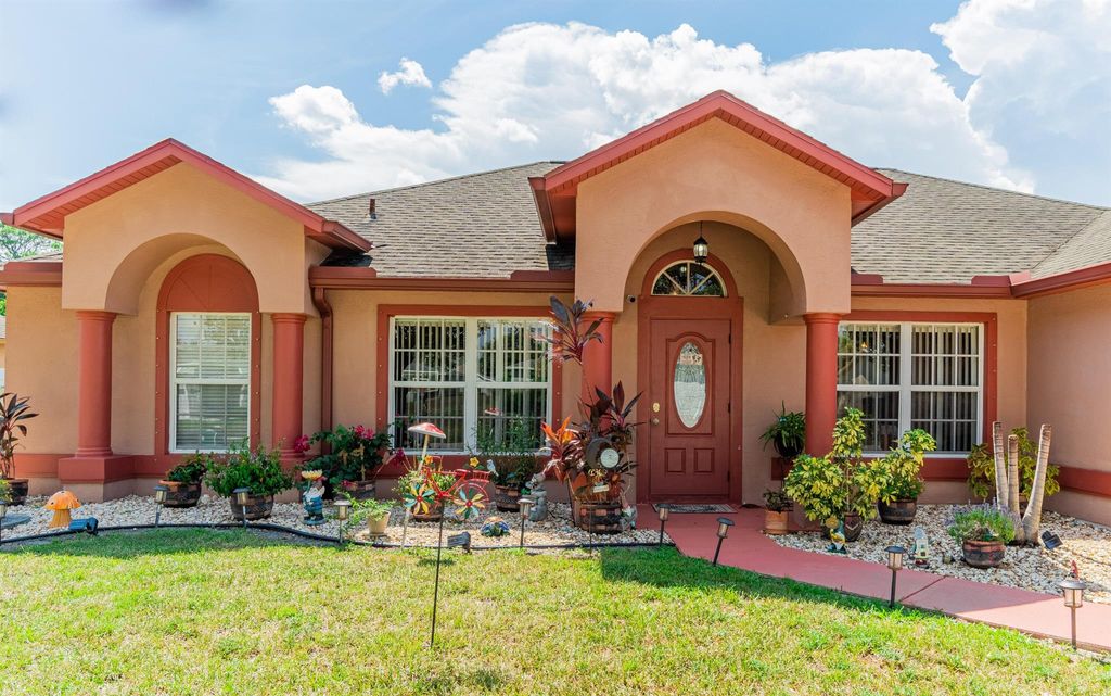 Photo of 3542 SW Rosardo Street, Port Saint Lucie, FL 34953 (MLS # R11095193)
