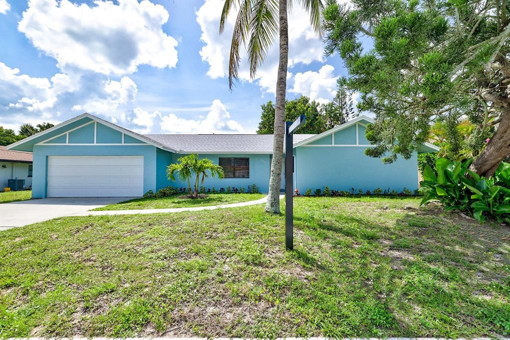 Photo of 354 E Prima Vista Boulevard, Port St Lucie, FL 34983 (MLS # R10904211)