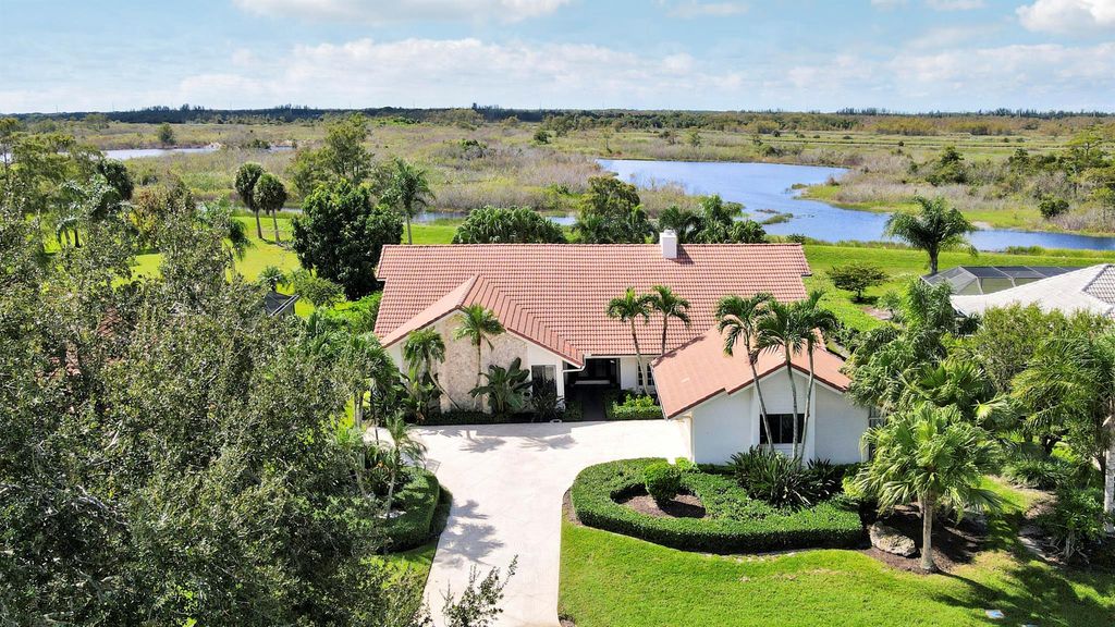 Photo of 37 Dunbar Road, Palm Beach Gardens, FL 33418 (MLS # R11132649)