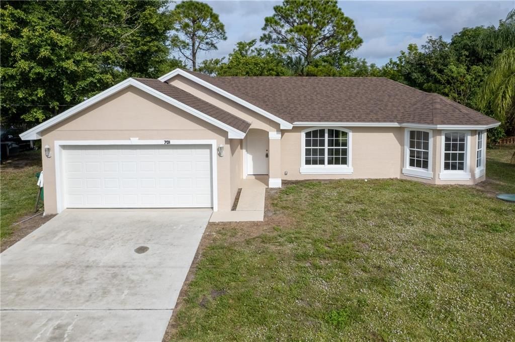 Photo of 701 NW Riverside Dr, Port Saint Lucie, FL 34983 (MLS # F10311701)