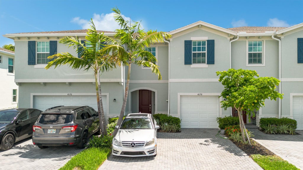 Photo of 4178 LAGOON SHORE Drive, Lake Worth, FL 33467 (MLS # B26084757)