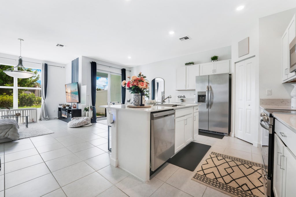 Photo of 4178 LAGOON SHORE Drive, Lake Worth, FL 33467 (MLS # B26084757)