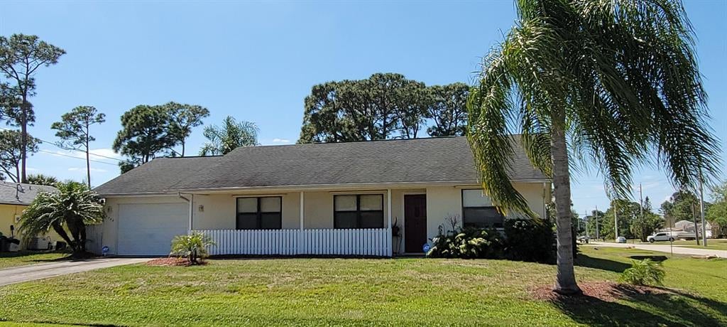 Photo of 1302 SW Irving Street, Port Saint Lucie, FL 34983 (MLS # R10700792)