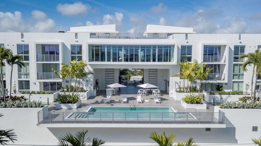 Leave the cold behind and step into the sunshine and energy of downtown Delray Beach! Welcome to 111 First Delray, a five-story boutique condominium offering just 66 residences - quietly tucked away, yet moments from everything. This desirable and rarely available Fourth-floor, NE corner residence features 2 beds/2baths, including soaking tub, and a wrap around balcony ideal for indoor/outdoor living. Interior finishes include Bosh and Electrolux appliances, blond wood-look flooring, large kitchen island topped with Ice Canyon granite and thoughtfully built-out closets throughout. Residents enjoy resort-style amenities including a fully equipped fitness center, a heated pool with cabanas, firepit, covered secured garage parking, lockable bicycle storage and smart-home technology. Perfectly positioned just one block from the famous entertainment venue of Atlantic Ave, less than a mile from Delray's Blue Flag-designated beach (one of three beaches in the US recognized for meeting strict environmental, safety, and accessibility standards), and moments from live entertainment at Arts Garage, this residence offers the best of coastal living with a vibrant cultural backdrop. Ideal for full-time residents, seasonal owners or investors seeking to lock-and-leave lifestyle in one of Florida's most walkable and desirable downtowns.