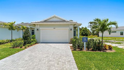 Photo of 228 SE Via Sangro, Port Saint Lucie, FL 34952 (MLS # F10538894)
