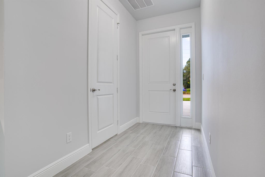 Photo of 2218 SW Alminar Street, Port Saint Lucie, FL 34953 (MLS # R10897217)