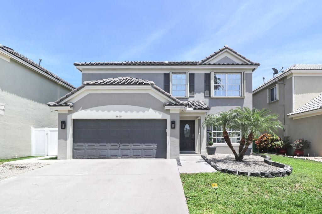 Photo of 5808 N Plum Bay Parkway, Tamarac, FL 33321 (MLS # B26026458)