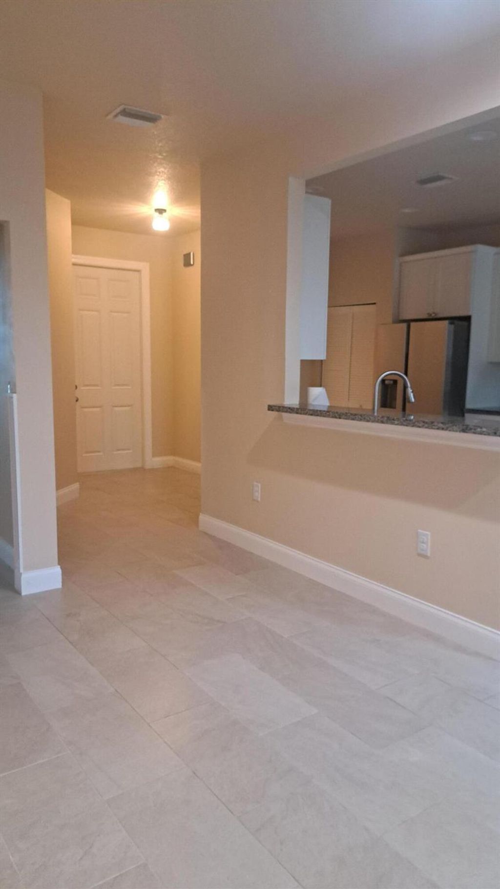 Photo of 301 SE Bayview Ter, Port Saint Lucie, FL 34953 (MLS # R11005089)