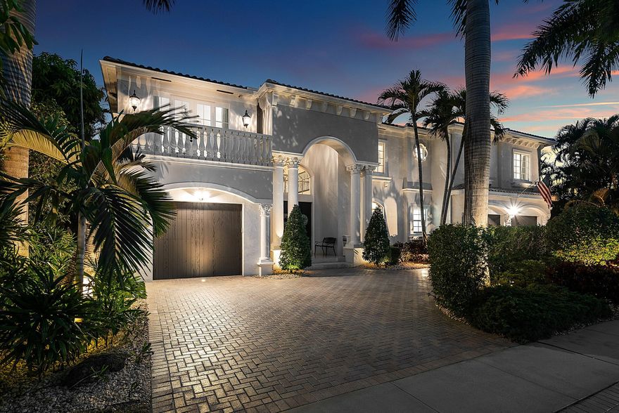 A striking grand double-door entry introduces this Mediterranean waterfront home in Boca Harbour, ideally located in Boca Raton. Soaring 20-foot ceilings and a dramatic foyer create an immediate sense of scale and sophistication, while Saturnia marble floors and rich hardwood upstairs add warmth and contrast. Custom millwork, coffered ceilings, and an open-concept layout offer a seamless flow for both entertaining and everyday living. The chef's kitchen features a Thermador gas range, Sub-Zero refrigeration, Bosch dishwasher, walk-in pantry, and a 200+ bottle wine refrigerator. A spacious island, butler's pantry, and bar area make hosting effortless. The expansive primary suite offers panoramic water views, a private balcony, motorized shades, a spa-inspired bath, and custom-fitted closets. An upstairs loft provides flexible space for a library, office, or media room. Additional features include a Control4 smart home system, elevator, fireplace, and elevated finishes throughout.  Outdoors, a private waterfront retreat awaits with desirable southern exposure. The resort-style pool and spa, Viking summer kitchen, and lush tropical landscaping create a true indoor-outdoor lifestyle. The renovated dock features concrete pilings, composite decking, water, electric, and a 15,000-pound boat lift, providing direct access to Lake Boca and the Atlantic Ocean. Additional upgrades include impact glass, porcelain pavers, tile-finished garages, updated HVAC systems, whole-house water treatment, and reverse osmosis filtration. With no HOA restrictions, this Boca Raton waterfront home offers flexibility, privacy, and luxury in one of the area's premier boating communities.  More than a home, this is a rare opportunity to experience Boca Raton waterfront living with direct ocean access in sought-after Boca Harbour.  The information provided, including but not limited to prices, measurements, square footages, lot sizes, features, finishes, and calculations, is subject to errors, omissions, or changes without notice. All information should be independently verified, and all parties are encouraged to perform their own due diligence.
