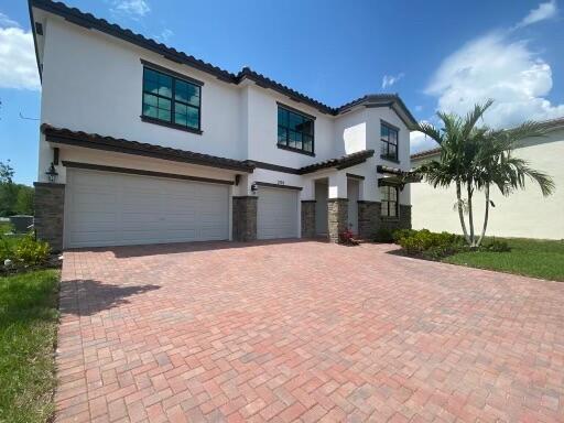Magnificent lake view single-family home in Prestigious Bella Sera. New development and new house. Close to everything, Hospitals, Restaurants, shopping malls, Highways, Polo fields, beaches and more!!!!!!!! It won't last.WATER FILTRATION SYSTEM ADDED FOR SOFT CLEANING AND REVERSE OSMOSIS DRINKING WATER