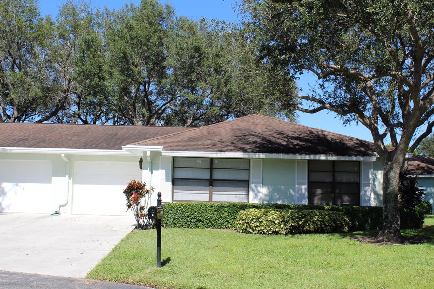 Check out this spacious villa in a vibrant 55+ active adult community! The updated kitchen and refreshed bathrooms with new vanities give this home a modern touch. Both bedrooms are large and comfortable with plush carpeting, and you'll love the peaceful green space behind the villa -- perfect for relaxing outdoors. Just steps away from the sparkling saltwater pool and community clubhouse, where you can enjoy the library, social clubs, and plenty of activities to stay active and engaged. Water and basic cable are included in the rent for added convenience. Ideally located near shopping, dining, entertainment, and hospitals -- everything you need is just minutes away!