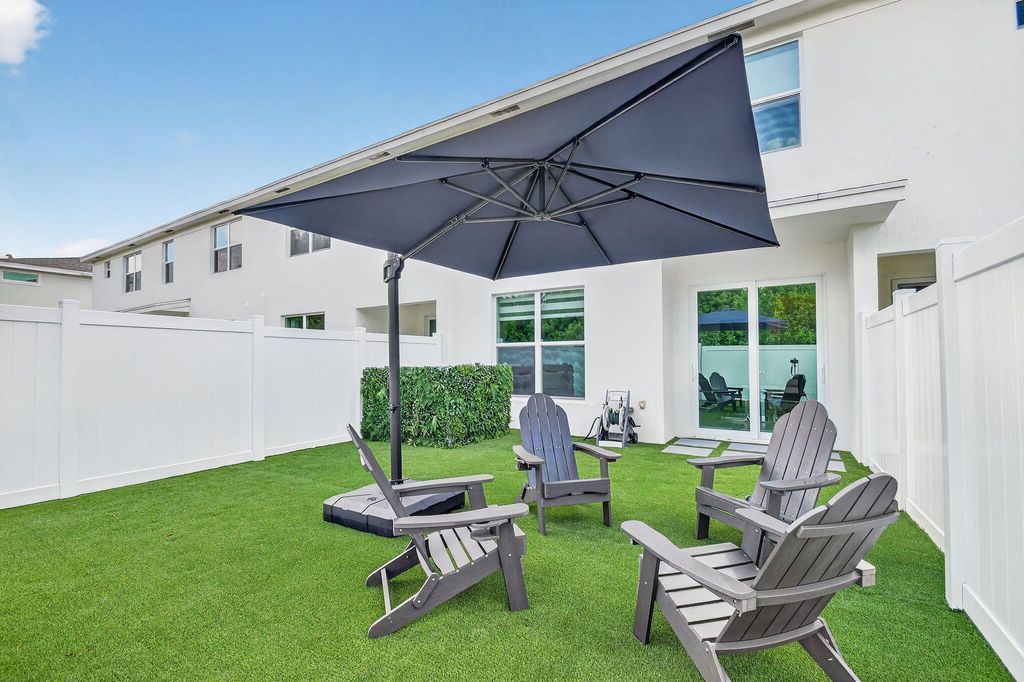 Photo of 4319 Hammock Grove Drive, Lake Worth, FL 33467 (MLS # R11135298)