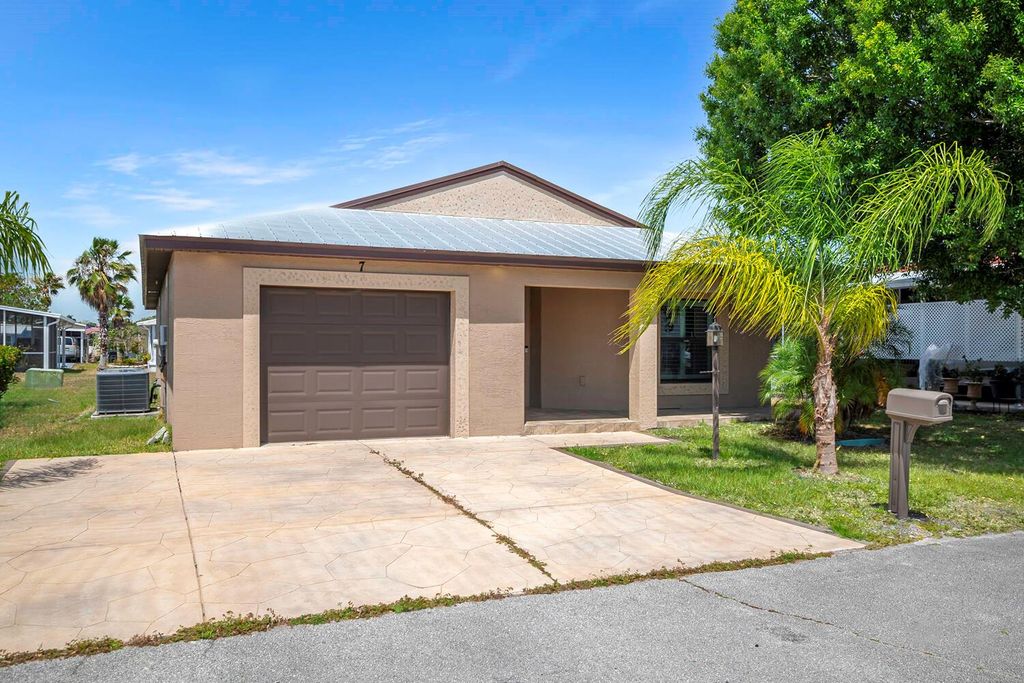 Photo of 7 Kassaba Lane, Port Saint Lucie, FL 34952 (MLS # R10983388)