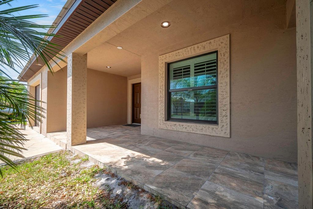 Photo of 7 Kassaba Lane, Port Saint Lucie, FL 34952 (MLS # R10983388)