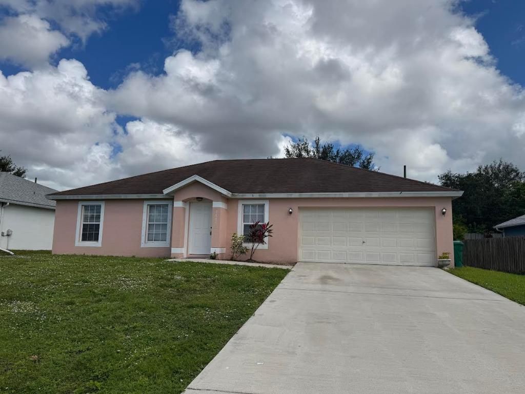 Photo of 3825 SW Kakopo Street, Port Saint Lucie, FL 34953 (MLS # R11136529)