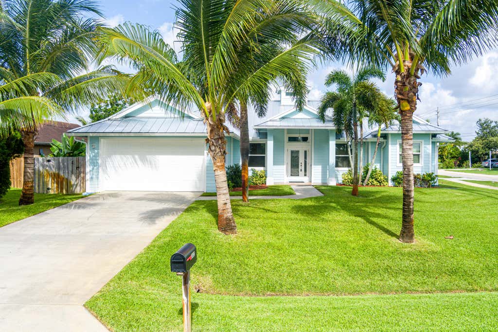 Photo of 3402 SW San Benito Street, Port Saint Lucie, FL 34953 (MLS # R11098529)